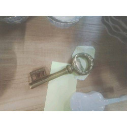 TIRE BOUCHON CLE BRONZE
