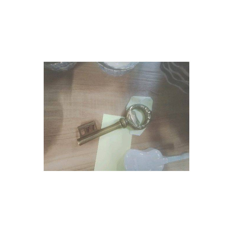 TIRE BOUCHON CLE BRONZE